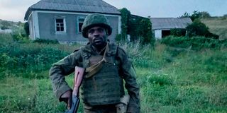 Richard Omondi posses for a photo while in Russia. 