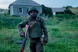 Richard Omondi posses for a photo while in Russia. 