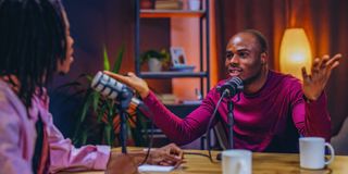 Men talking on a podcast