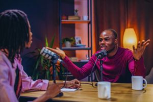 Men talking on a podcast