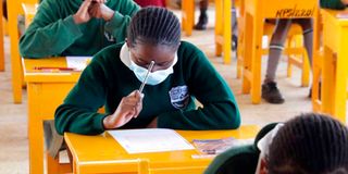Candidates doing KCPE exam