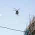 A helicopter flies over a part of Kisumu. 