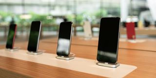 Smartphones on the shelf of the technology store.