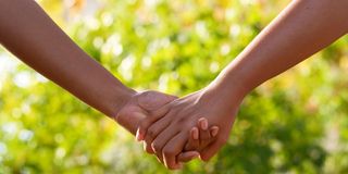 women holding hands