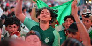 2026-07-02T022255Z_721615127_UP1EM7206M554_RTRMADP_3_SOCCER-WORLDCUP-SWI-DZA-FANS