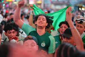 2026-07-02T022255Z_721615127_UP1EM7206M554_RTRMADP_3_SOCCER-WORLDCUP-SWI-DZA-FANS
