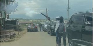 A screengrab of a video of armed men arriving at a polling station in Ol Kalou.