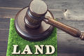 Gavel and patch of land