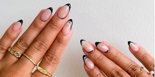 Woman's hand with black chrome nails