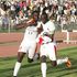 Macdonald Mariga celebrates his goal against Angola with Denis Oliench