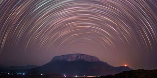 The Samburu night sky with Mt Ololokwe in the background.