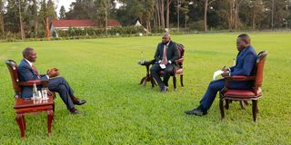 Ruto with Justus Wanga and Justus Ochieng