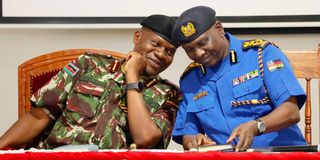 Douglas Kanja and Gilbert Masengeli