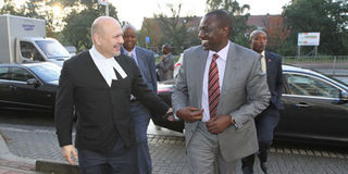 Deputy President William Ruto with his lawyer Karim Khan
